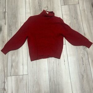 Red turtleneck sweater